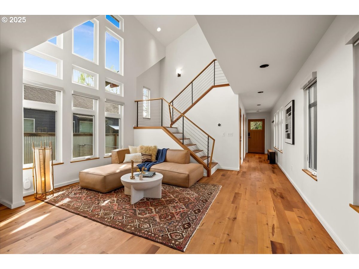 8316 Southeast 7th Avenue Portland, OR 97202 - Photo 7 of 44 a living room with furniture and a fireplace