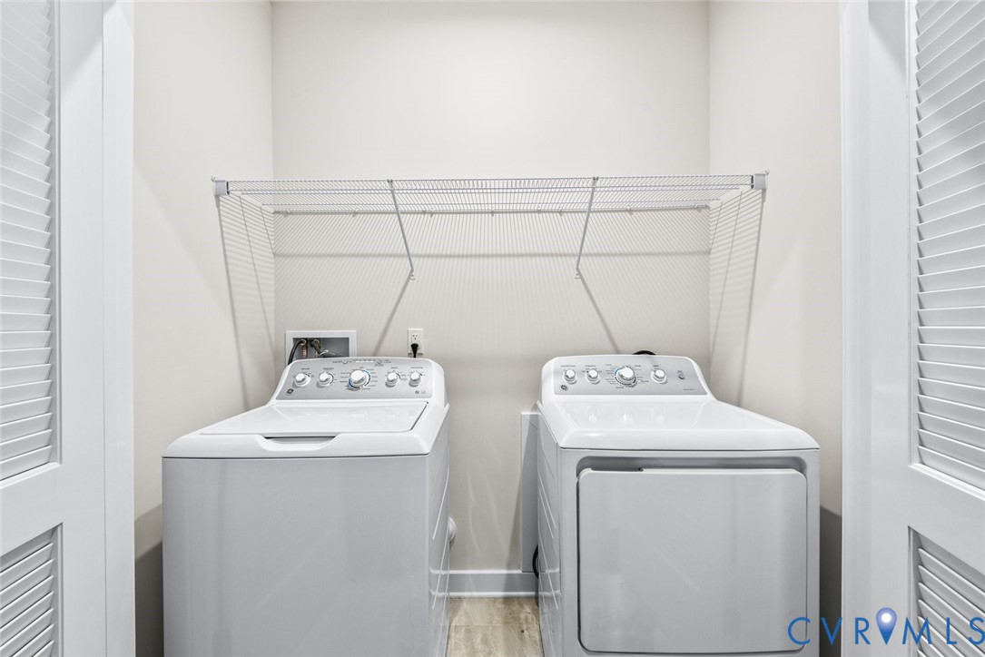 6655 Citory Way, Unit 103 Moseley, VA 23120 - Photo 23 of 48 a utility room with dryer and washer