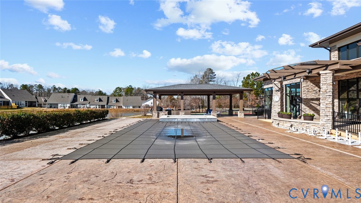 6655 Citory Way, Unit 103 Moseley, VA 23120 - Photo 35 of 48 a view of a house with a yard