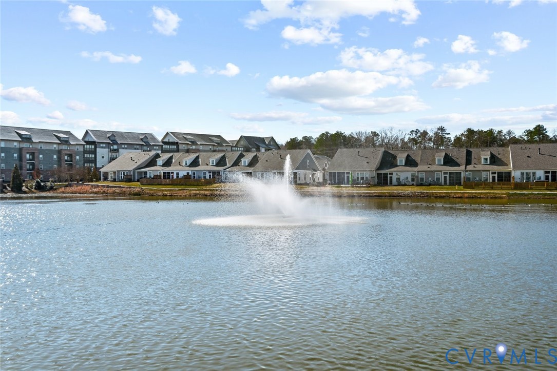 6655 Citory Way, Unit 103 Moseley, VA 23120 - Photo 44 of 48 a view of a lake with houses