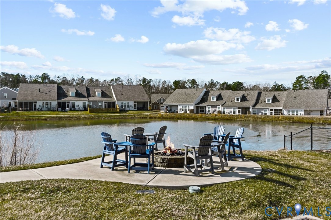 6655 Citory Way, Unit 103 Moseley, VA 23120 - Photo 46 of 48 a view of a lake with houses