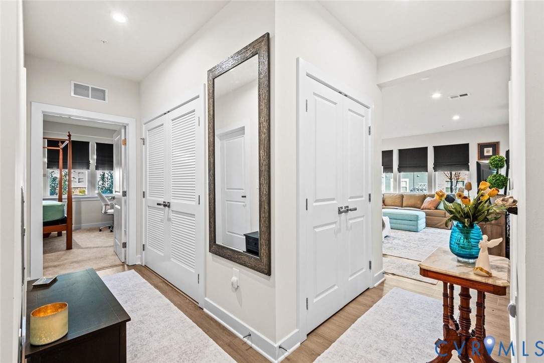 6655 Citory Way, Unit 103 Moseley, VA 23120 - Photo 6 of 48 a living room with furniture and a potted plant