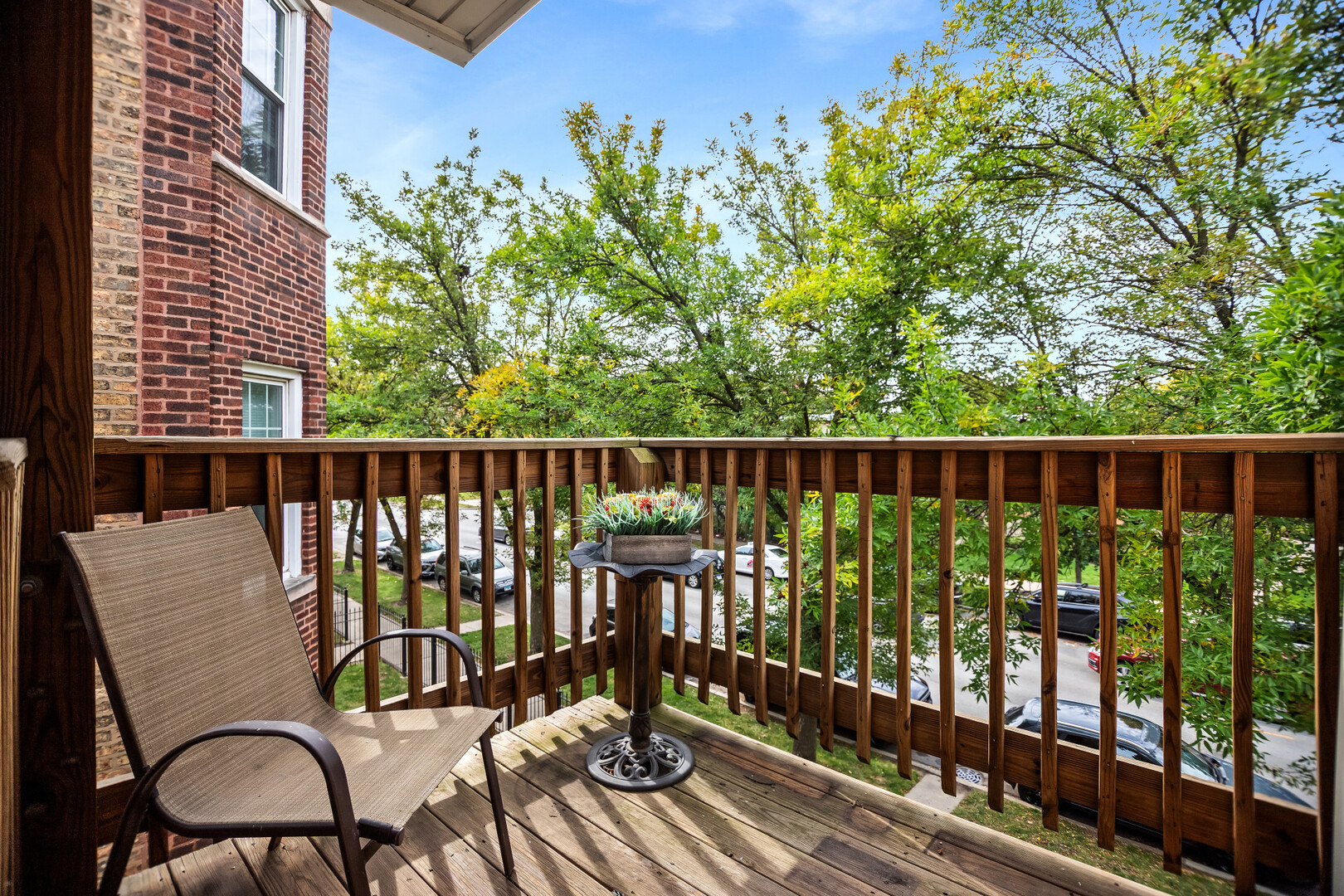 7019 North Ridge Boulevard, Unit 3A Chicago, IL 60645 - Photo 9 of 14 a view of balcony with wooden floor and outdoor seating