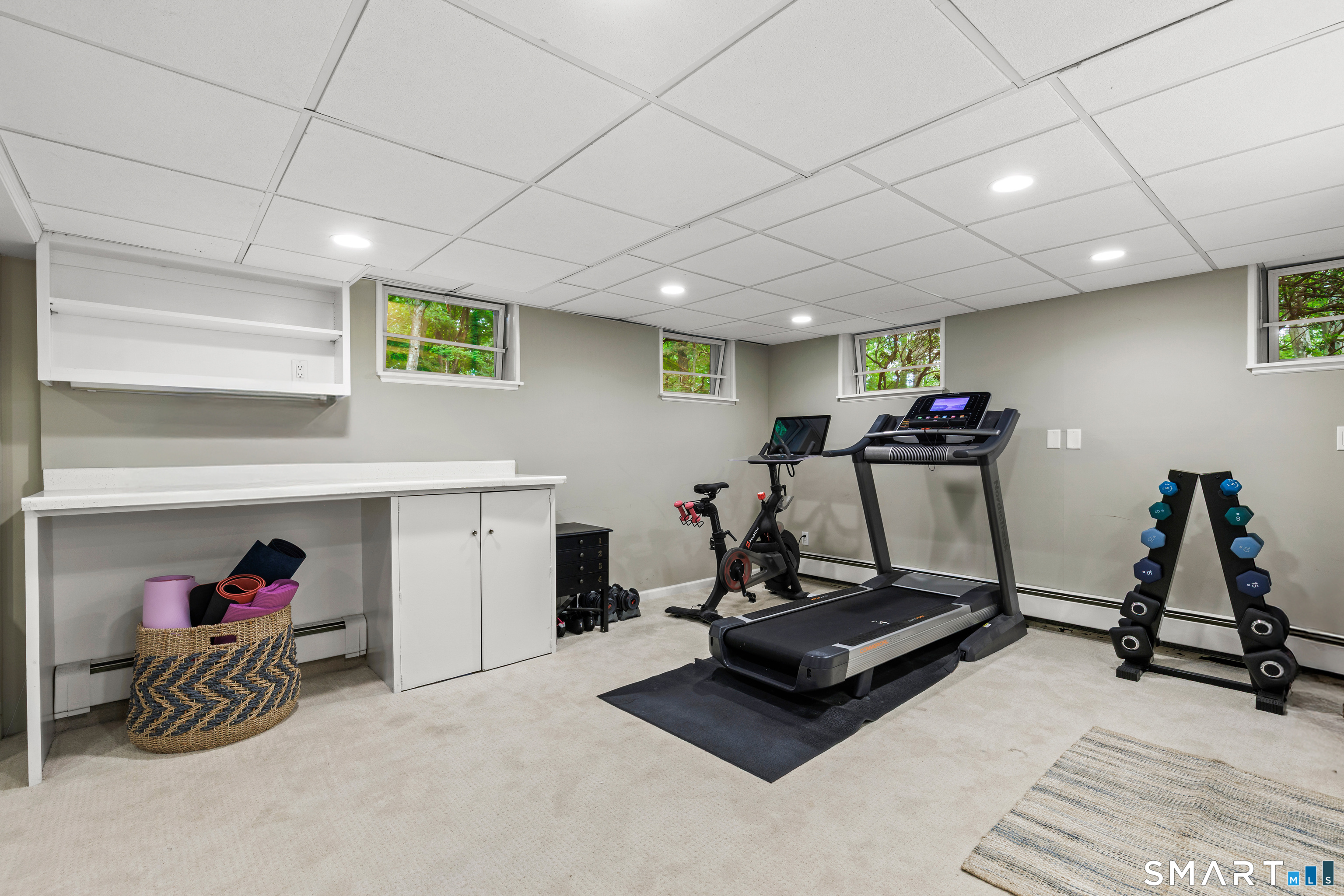 599 North Wilton Road New Canaan, CT 06840 - Photo 29 of 37 Lower level gym, office, playroom and half bathroom
