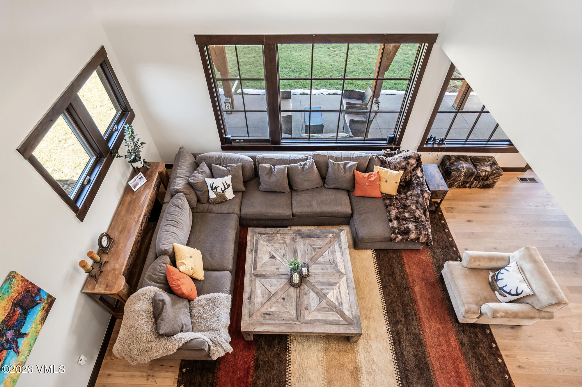 481 Hunters View Lane Eagle, CO 81631 - Photo 12 of 49 a living room with furniture and a large window