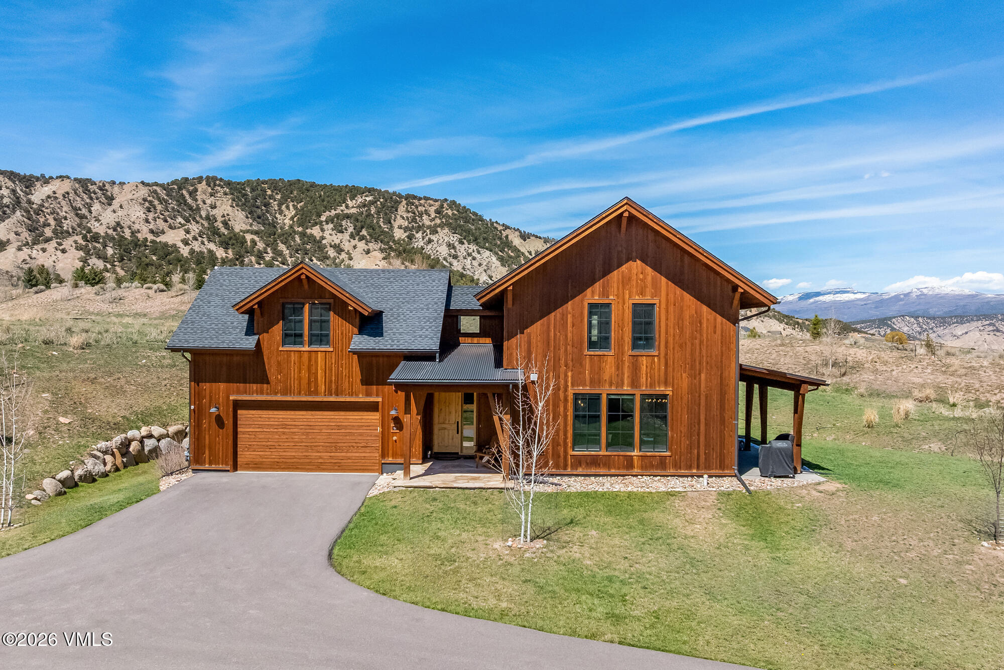481 Hunters View Lane Eagle, CO 81631 - Photo 37 of 49 a front view of a house with a yard
