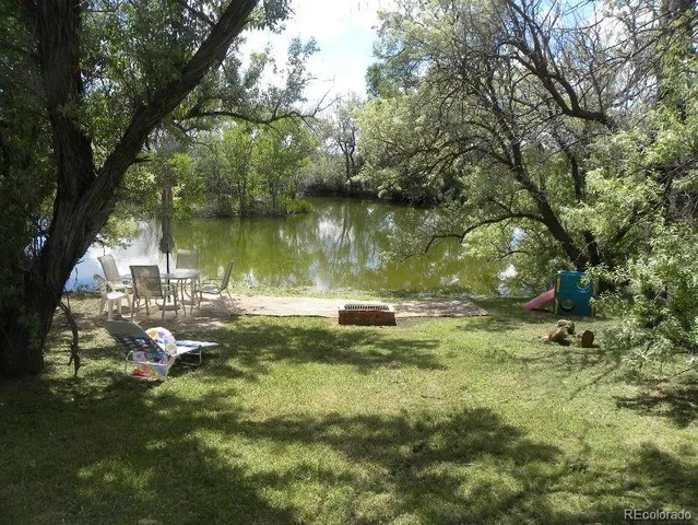 a view of a lake from a yard