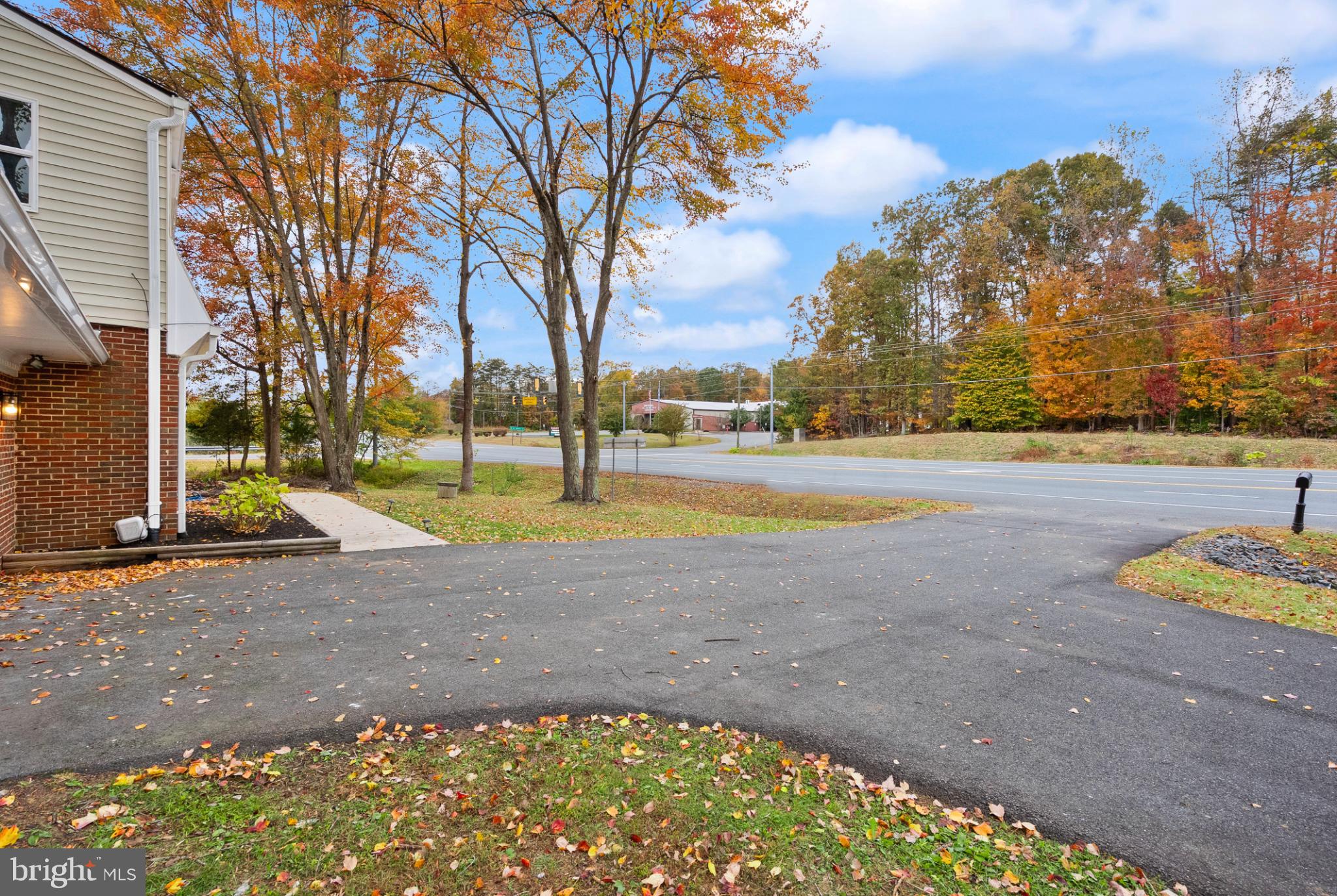 7075 Yates Ford Road Manassas, VA 20111 - Photo 6 of 54 Serene autumn landscape with vibrant foliage.