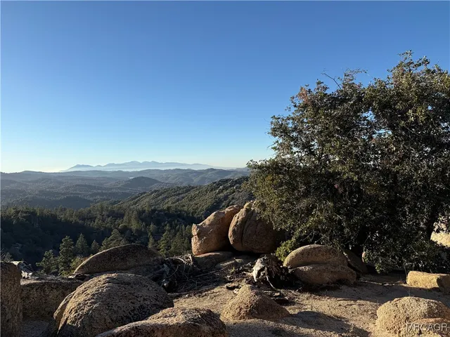 a view of a ocean with a mountain