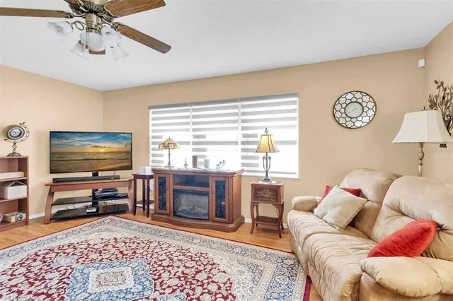 a kitchen with a sink cabinets and window