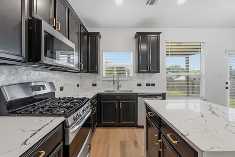$415,000 | 11509 Timber Heights Drive, Austin, TX 78754