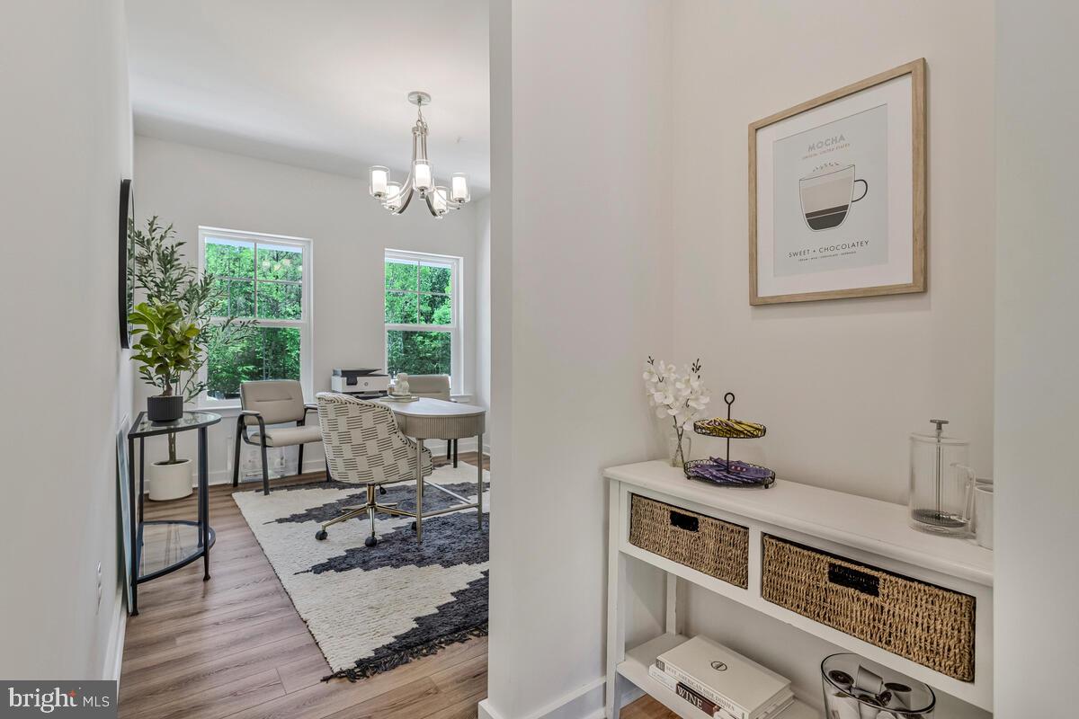 1302 Spruce Street Shady Side, MD 20764 - Photo 17 of 43 a view of a dining room with furniture window and outside view