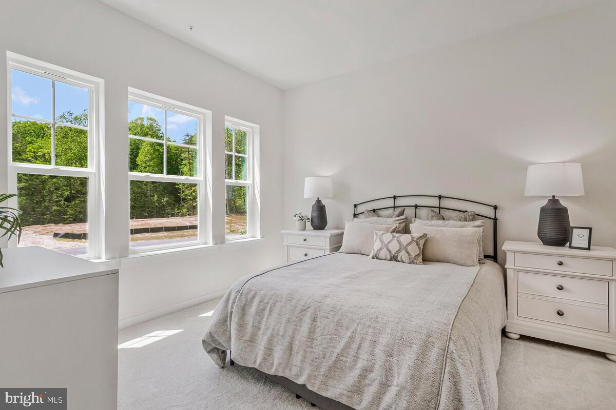 1302 Spruce Street Shady Side, MD 20764 - Photo 20 of 43 a bedroom with a bed and a window