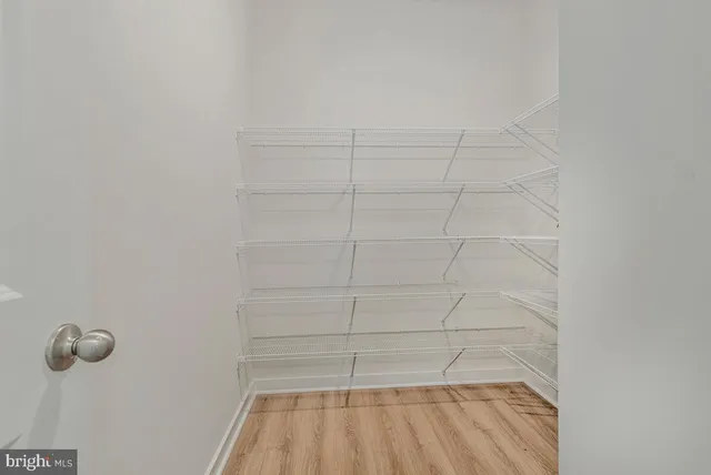 a view of a room with racks on the wall