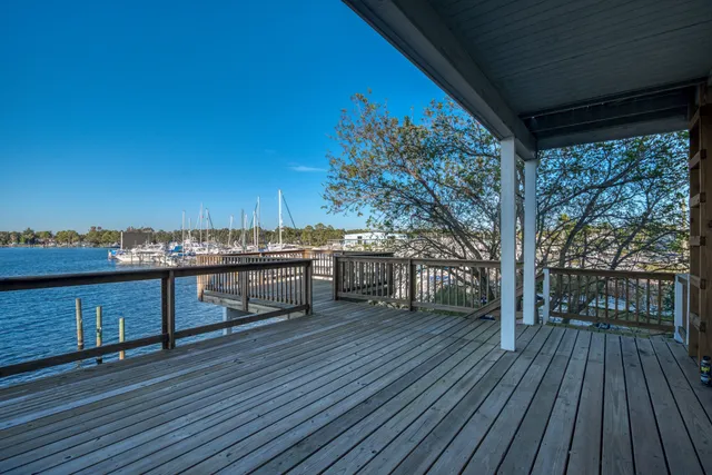 a bathroom with a toilet a sink and a mirror