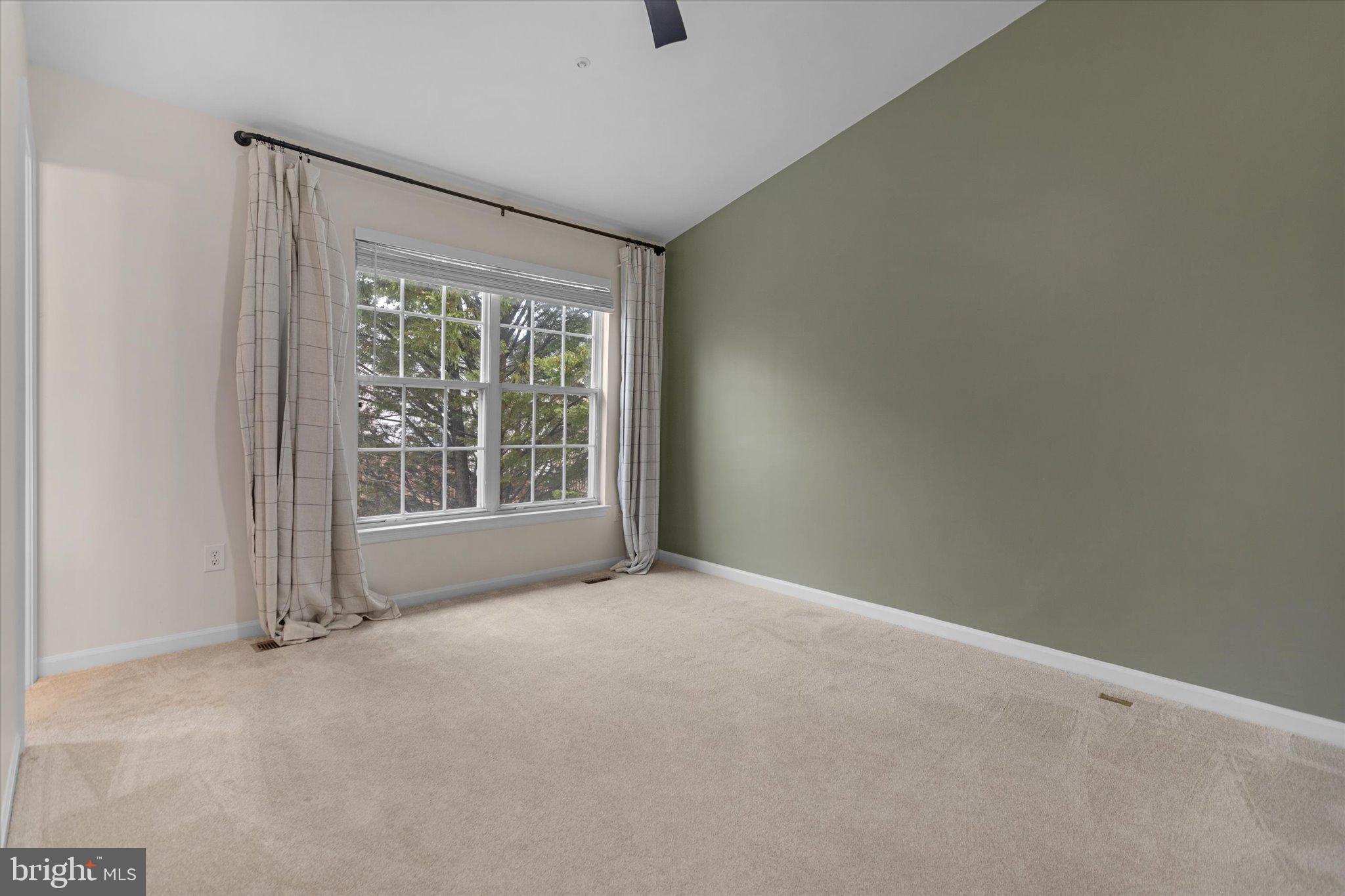 6105 Starburn Path Columbia, MD 21045 - Photo 12 of 30 a view of an empty room with a window