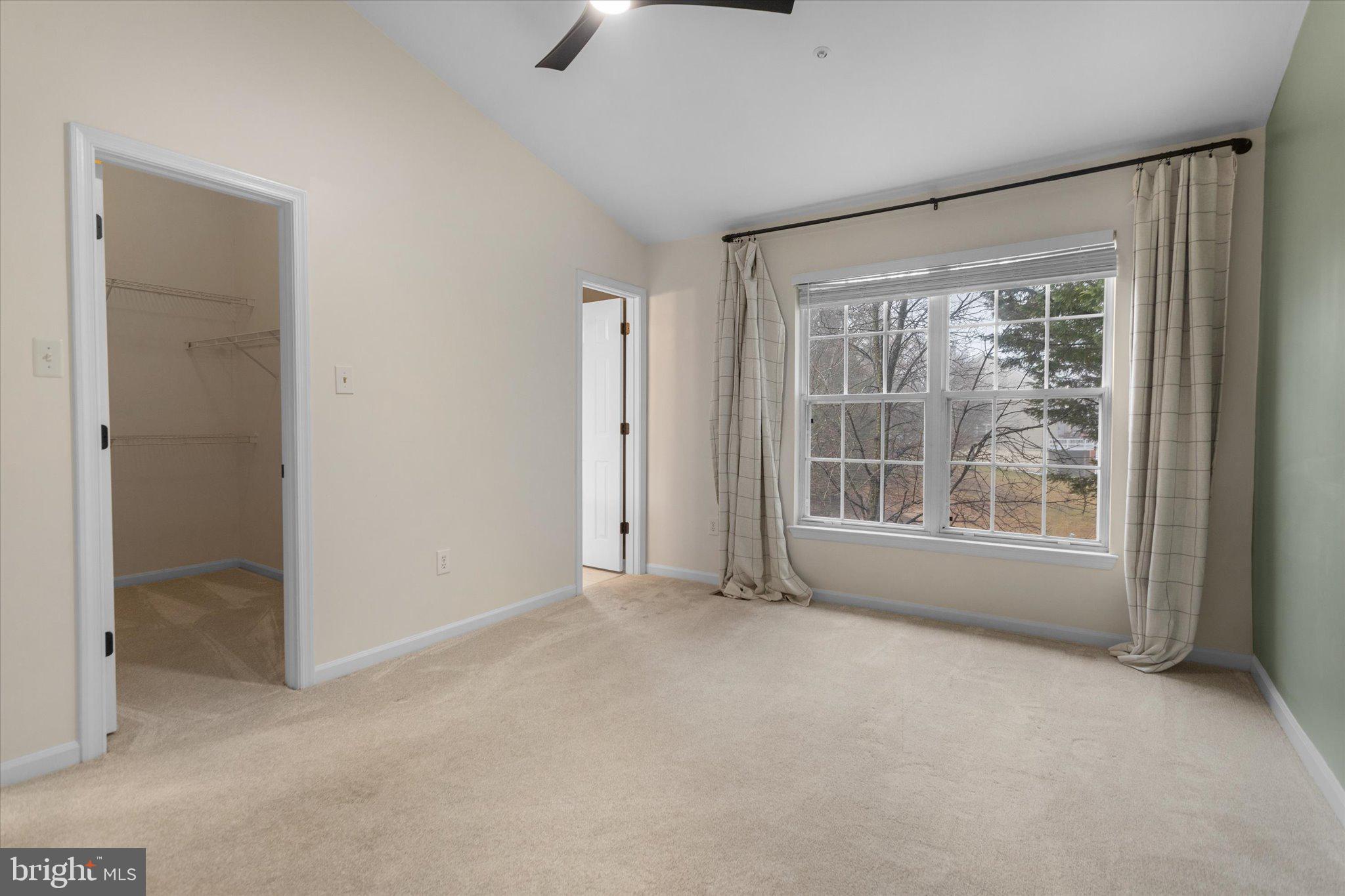 6105 Starburn Path Columbia, MD 21045 - Photo 13 of 30 an empty room with a empty space and windows