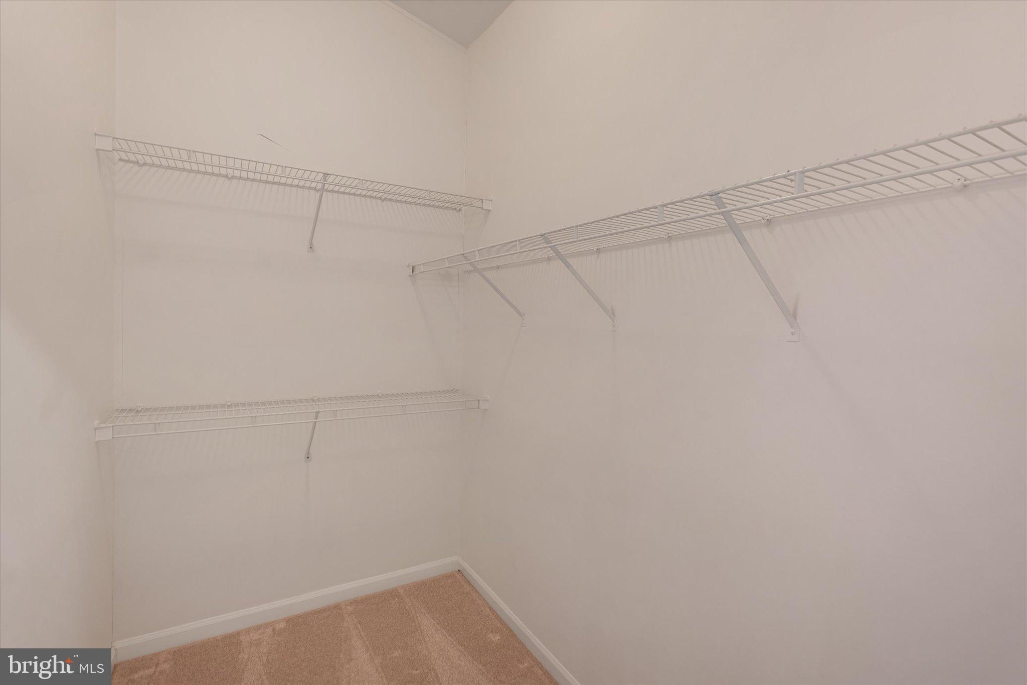 6105 Starburn Path Columbia, MD 21045 - Photo 16 of 30 a view of a room with racks on the wall