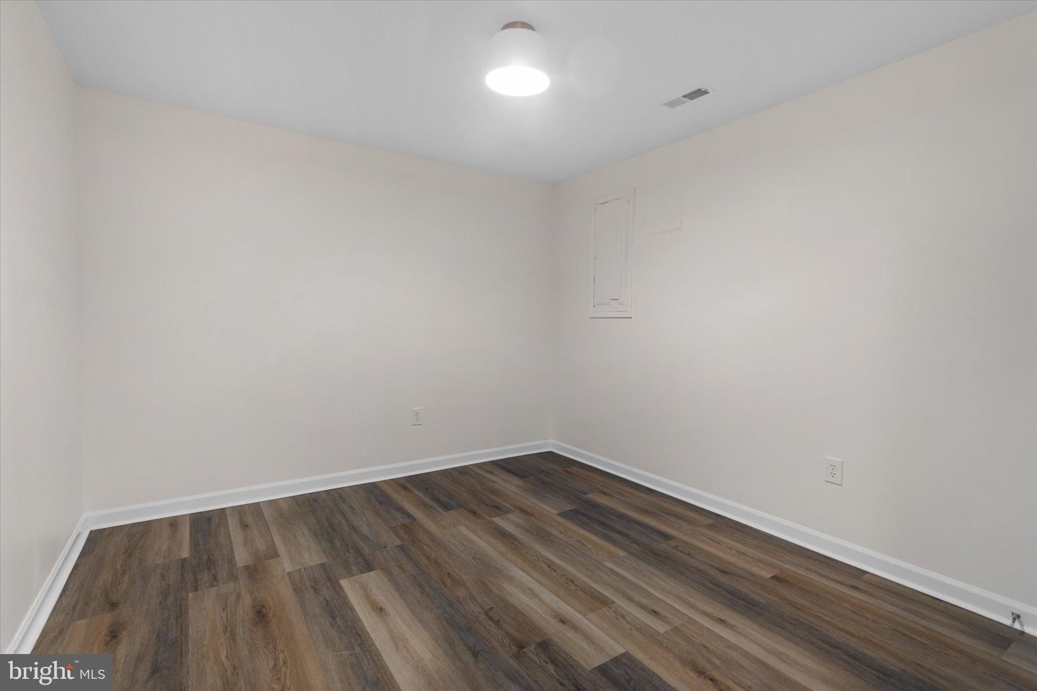 6105 Starburn Path Columbia, MD 21045 - Photo 23 of 30 a view of small space with wooden floor and windows