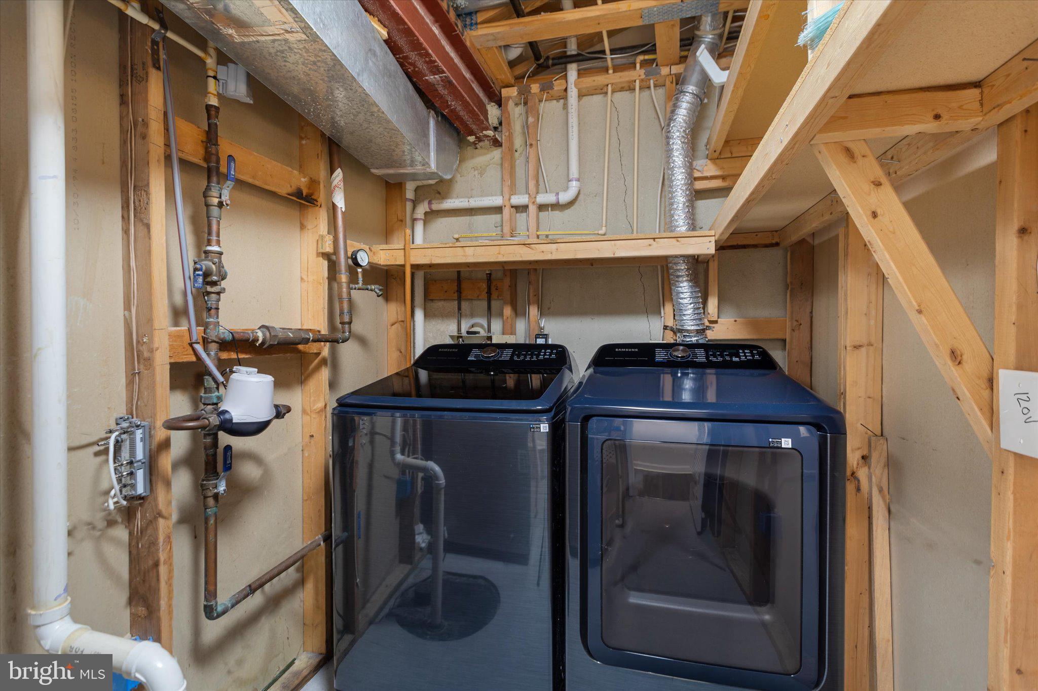 6105 Starburn Path Columbia, MD 21045 - Photo 26 of 30 a utility room with dryer and washer