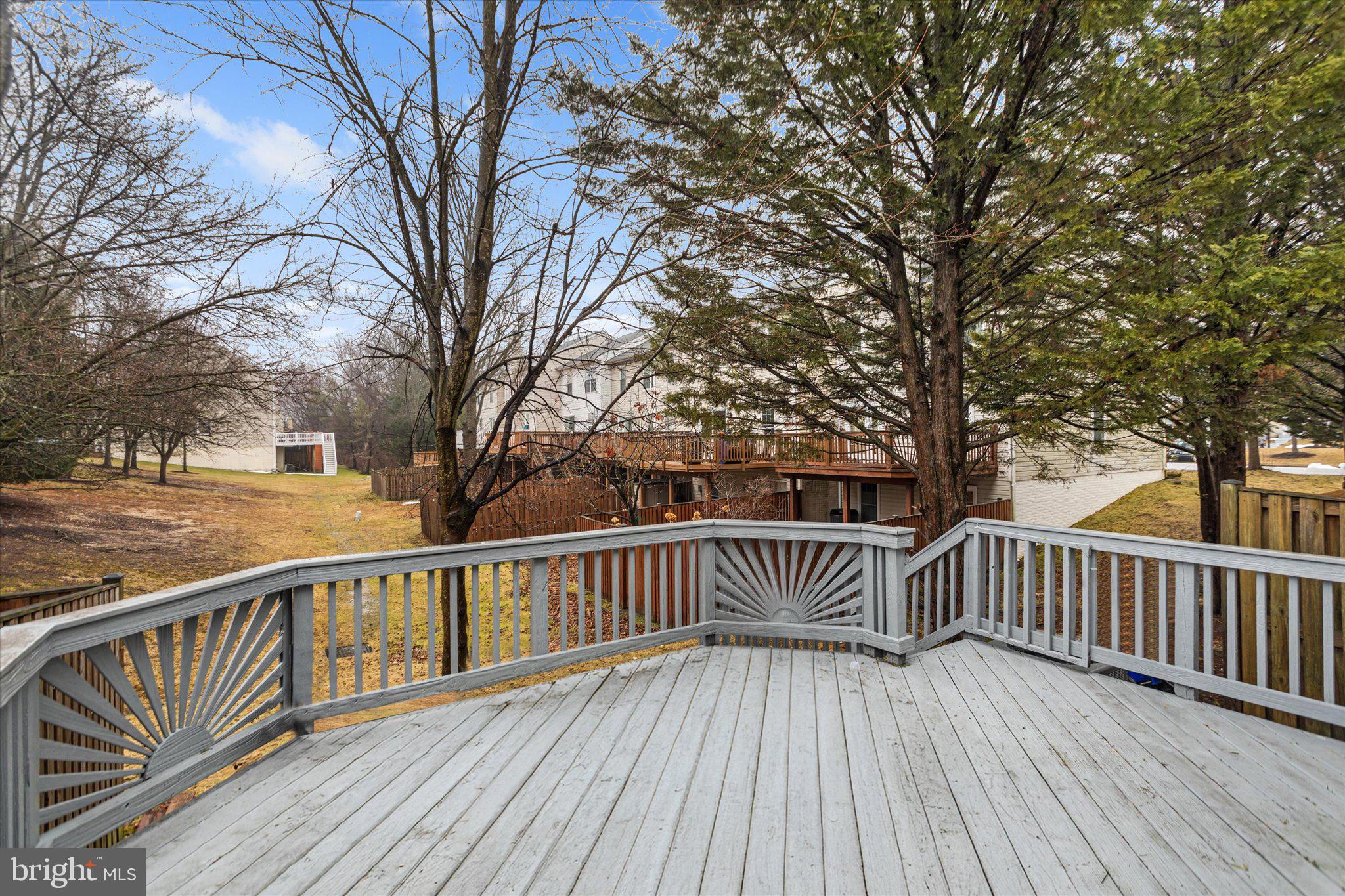 6105 Starburn Path Columbia, MD 21045 - Photo 28 of 30 a view of deck with wooden floor and fence