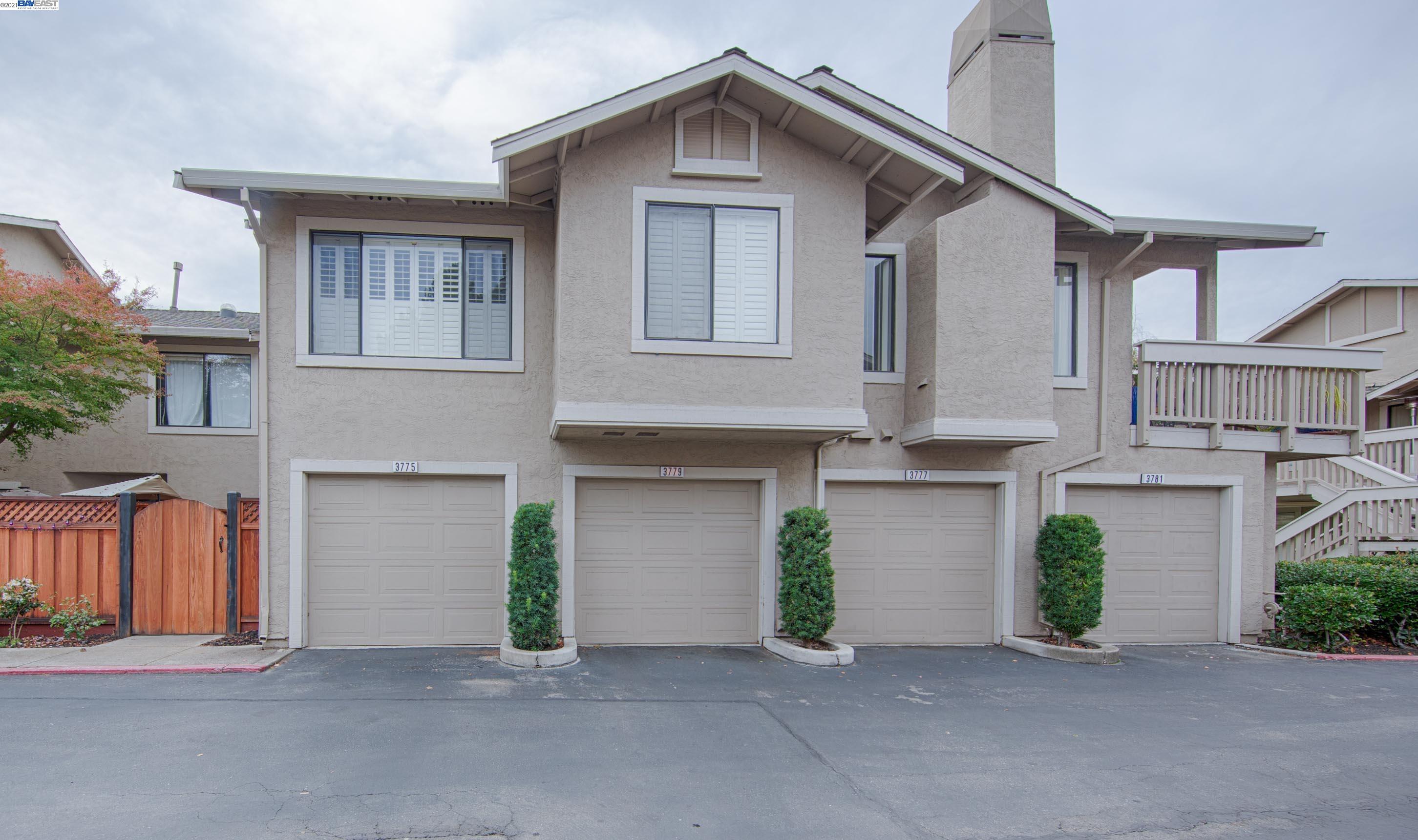 a view of a house with a garage and a garage