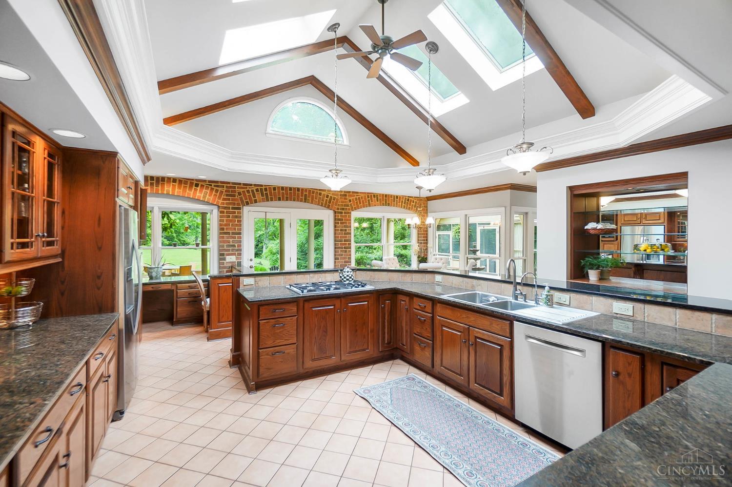 8000 Graves Road Cincinnati, OH 45243 - Photo 15 of 85 Kitchen with Wood Beams and Vaulted Ceilings & Skylights