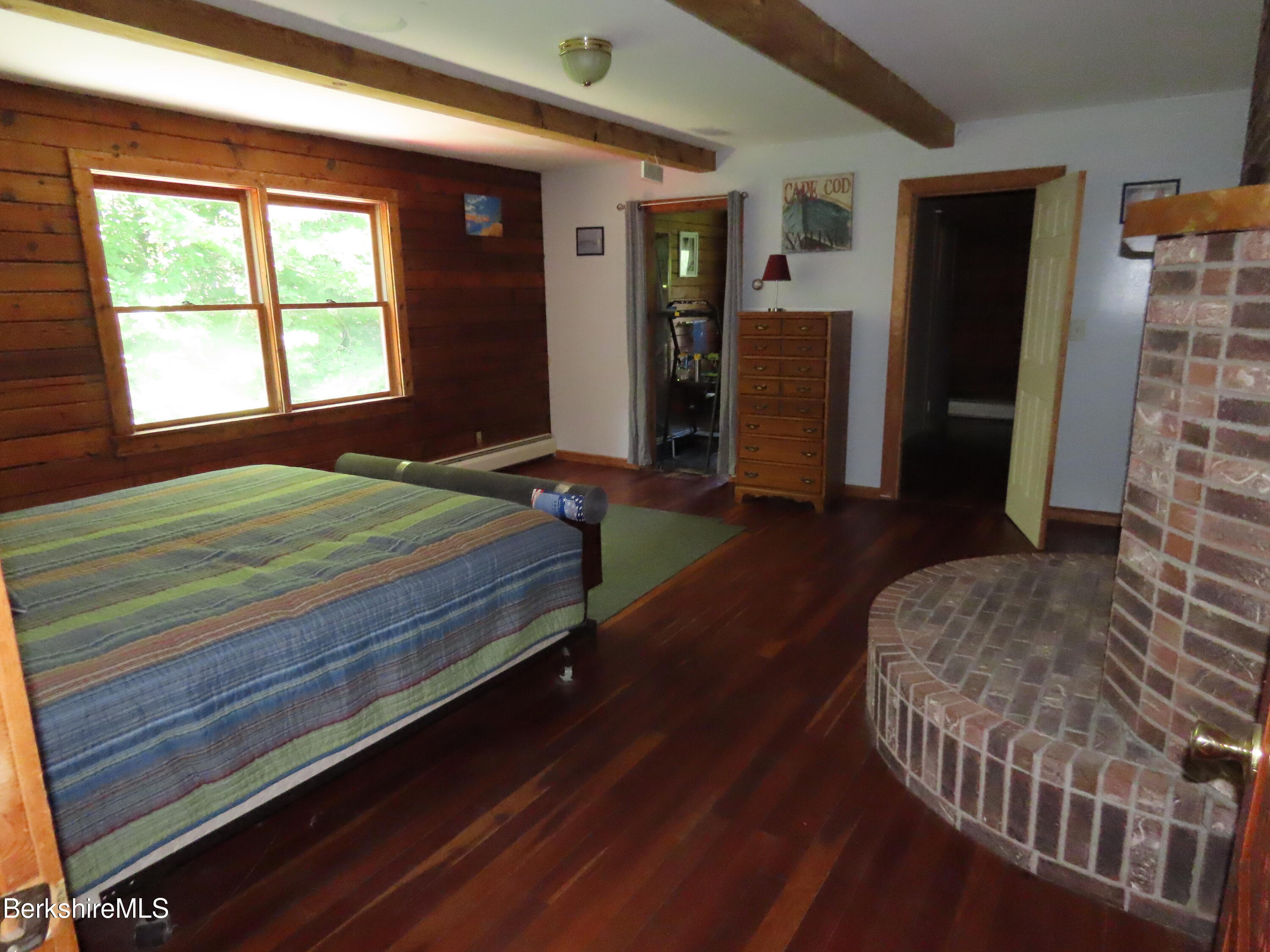 460 Sparrow Drive Stamford, VT 05352 - Photo 36 of 79 a bedroom with a bed and a window