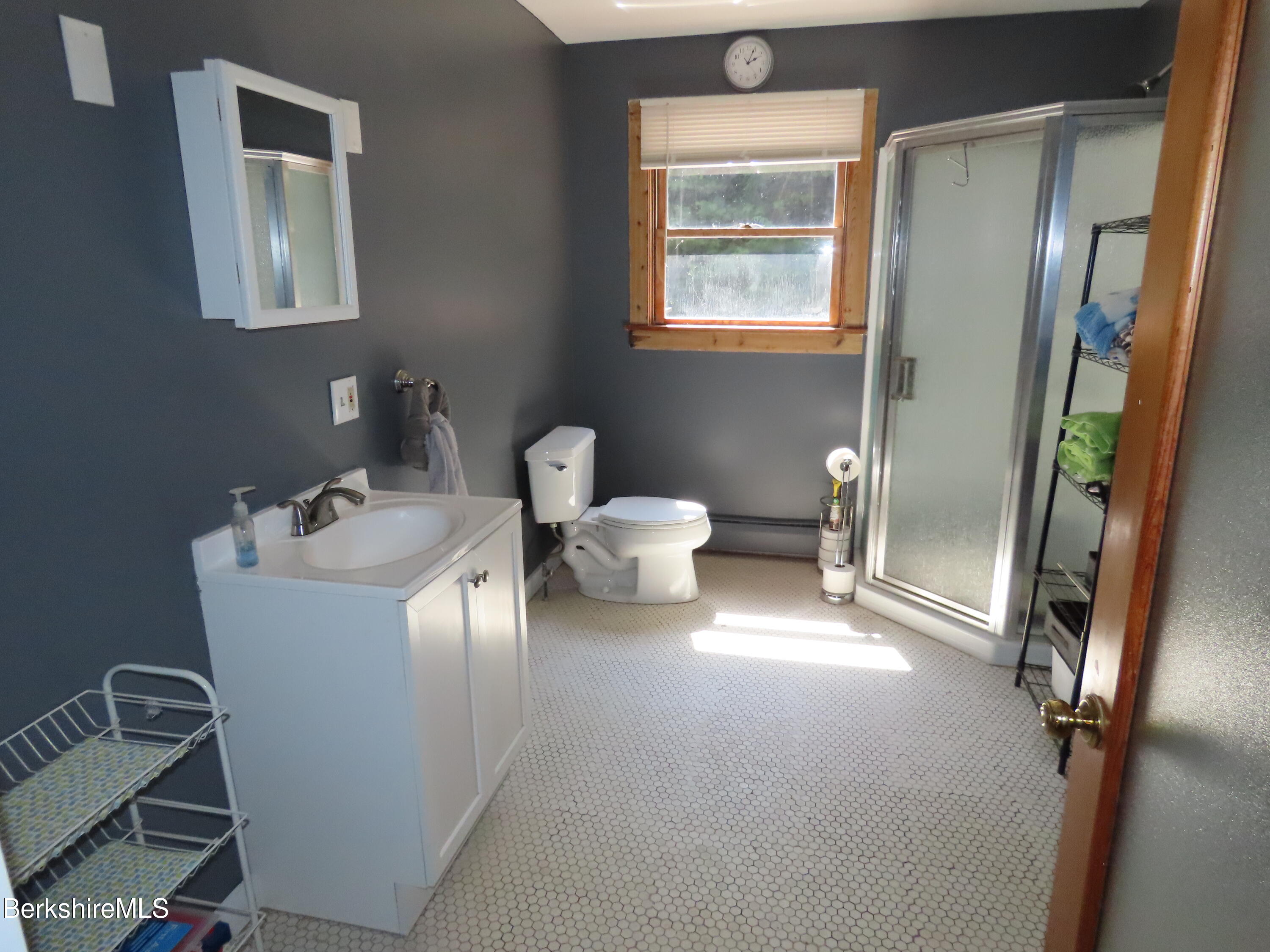 460 Sparrow Drive Stamford, VT 05352 - Photo 57 of 79 a bathroom with a sink toilet and shower