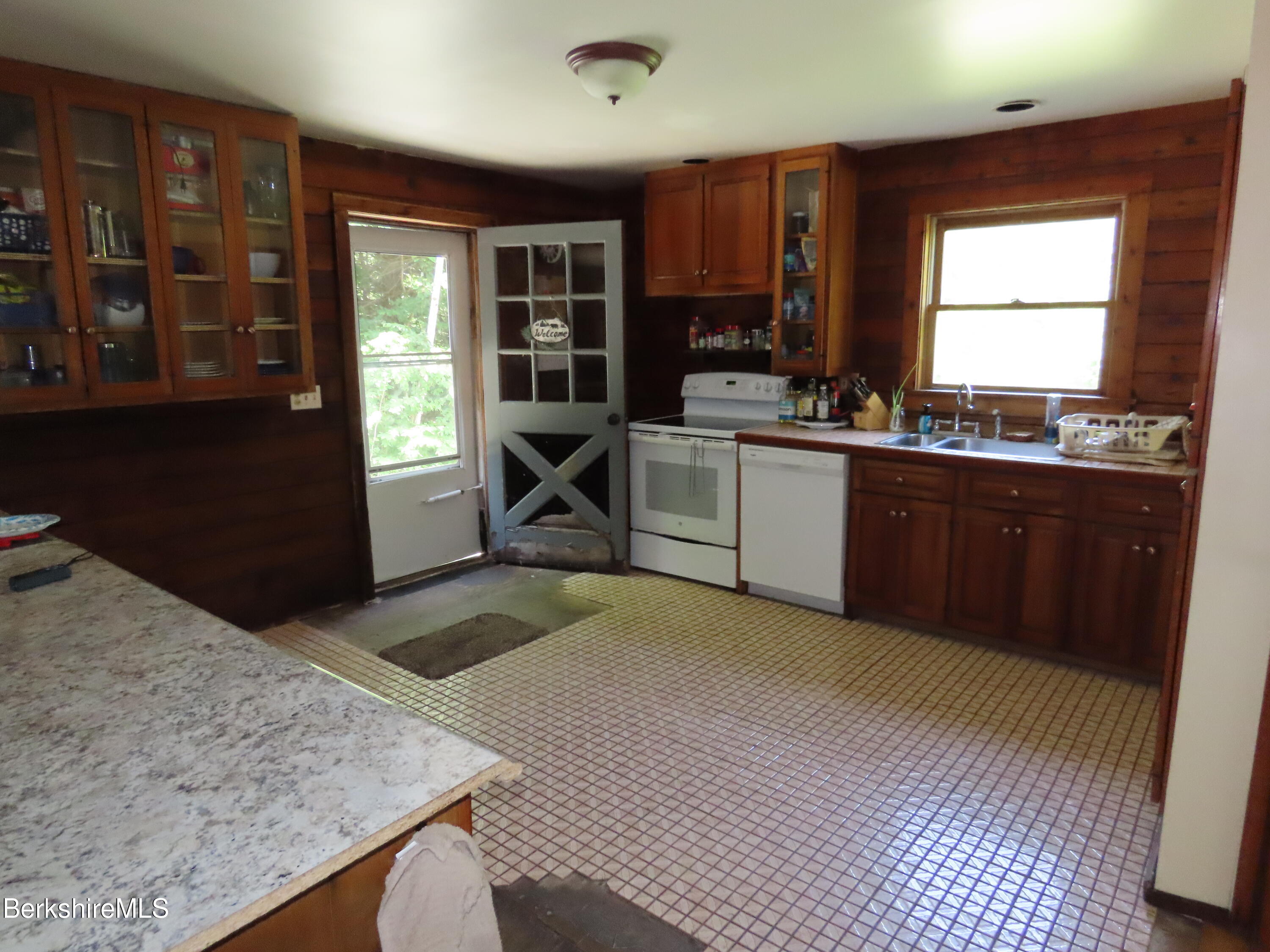 460 Sparrow Drive Stamford, VT 05352 - Photo 6 of 79 a kitchen with stainless steel appliances granite countertop a sink stove and refrigerator