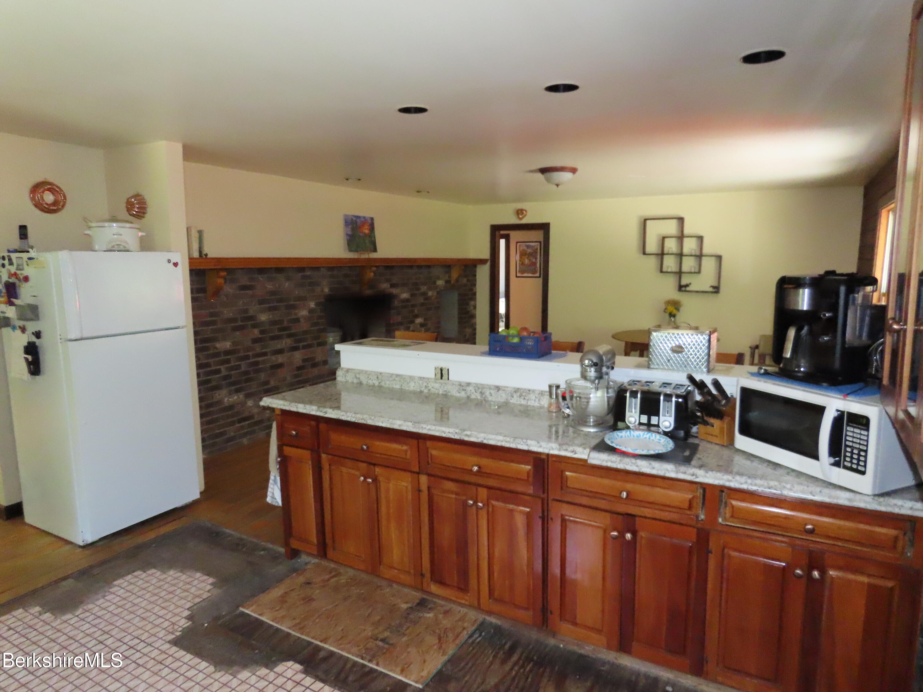 460 Sparrow Drive Stamford, VT 05352 - Photo 8 of 79 a kitchen with sink and refrigerator