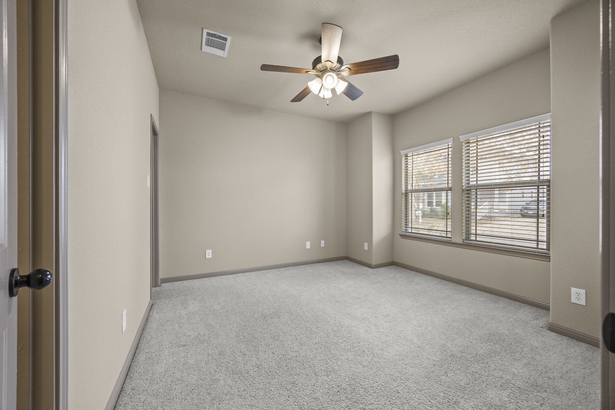 263 Cleveland Kyle, TX 78640 - Photo 4 of 20 Primary bedroom first floor.