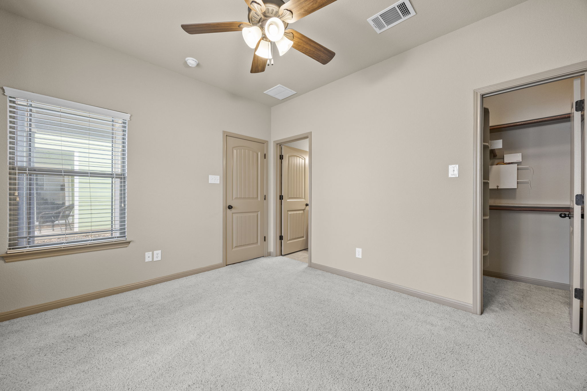 263 Cleveland Kyle, TX 78640 - Photo 5 of 20 Primary bedroom (angle 2)
