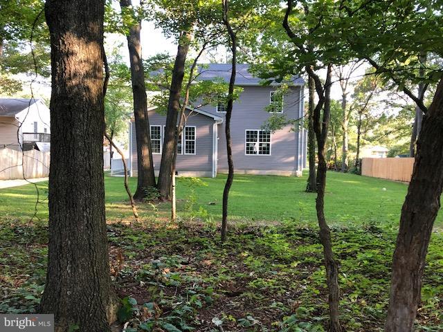 439 Manor Road Arnold, MD 21012 - Photo 3 of 16 Exterior (Rear) view fro wooded area