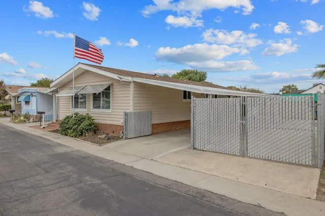 a front view of a house with a garage