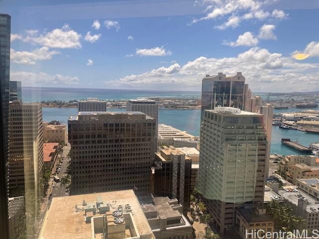 1088 Bishop Street, Unit 3606 Honolulu, HI 96813 - Photo 11 of 19 a view of a city with tall buildings