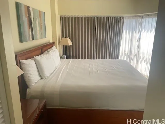 a bedroom with a bed