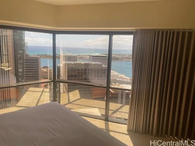 a view of an empty room and window