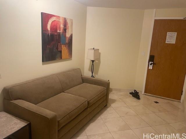 1088 Bishop Street, Unit 3606 Honolulu, HI 96813 - Photo 5 of 19 a bedroom with a bed and a couch