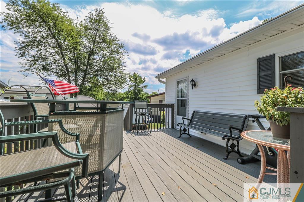 9 Morley Road, Unit 9 North Brunswick, NJ 08902 - Photo 15 of 19 a view of a chairs on the roof deck