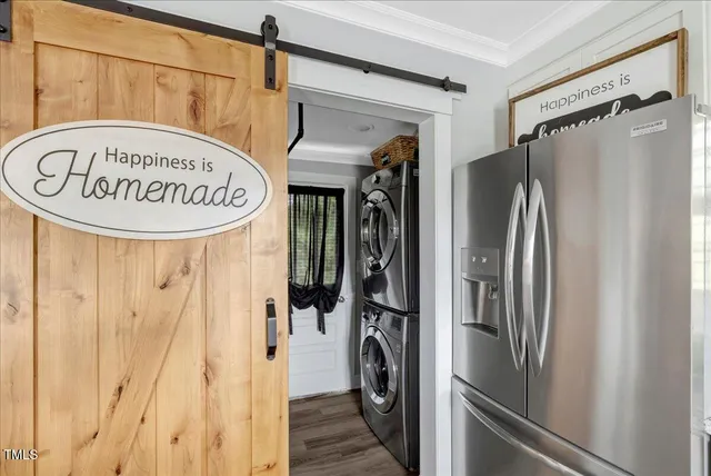 a view of a refrigerator in a kitchen