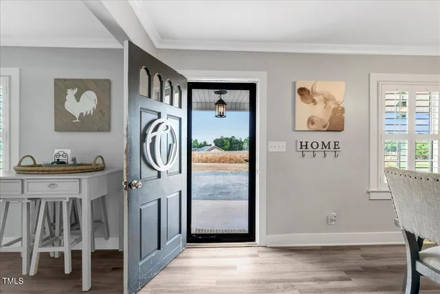 a view of entryway with wooden floor