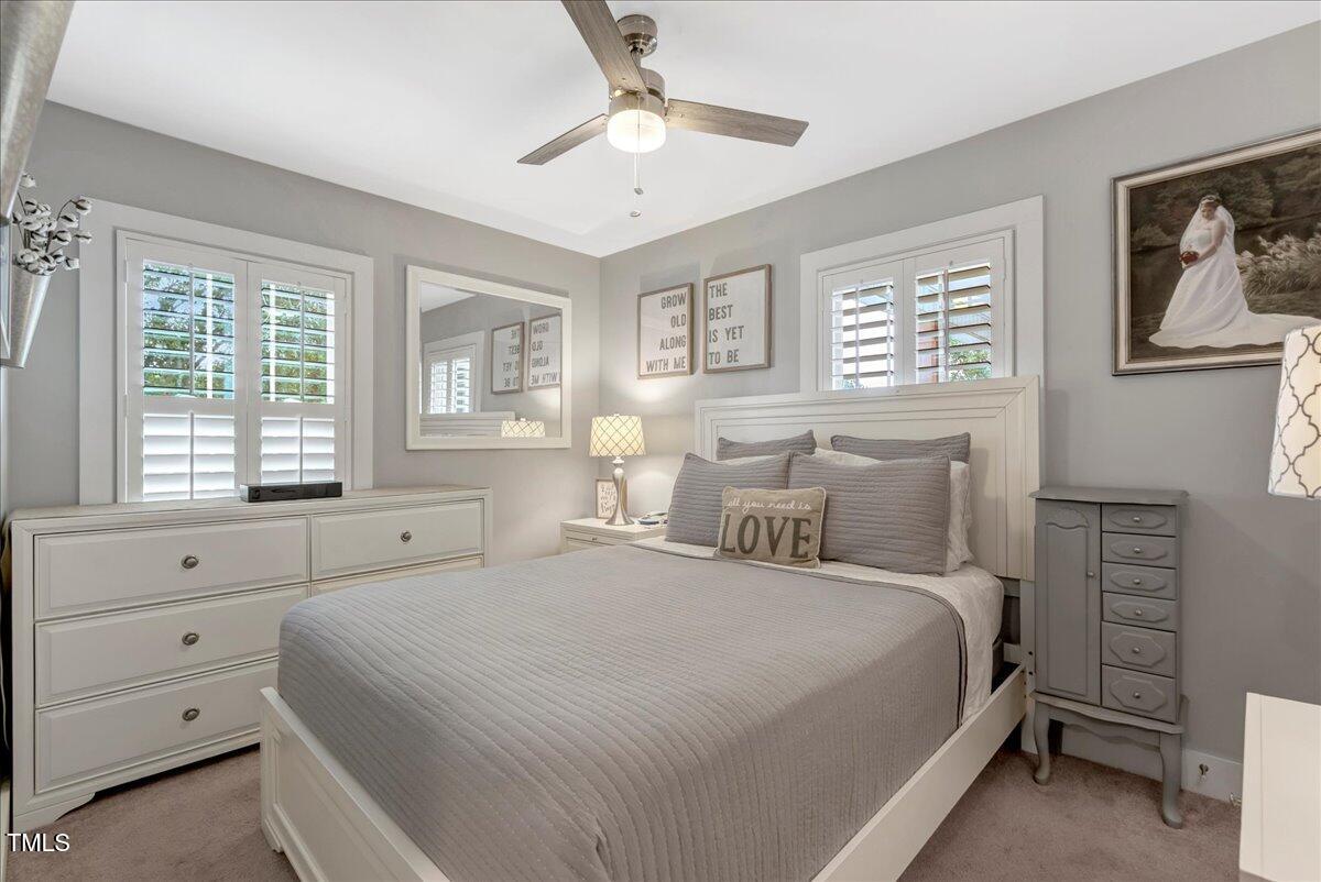 1856 Flat Rock Church Road Louisburg, NC 27549 - Photo 21 of 30 a bedroom with a bed and a window