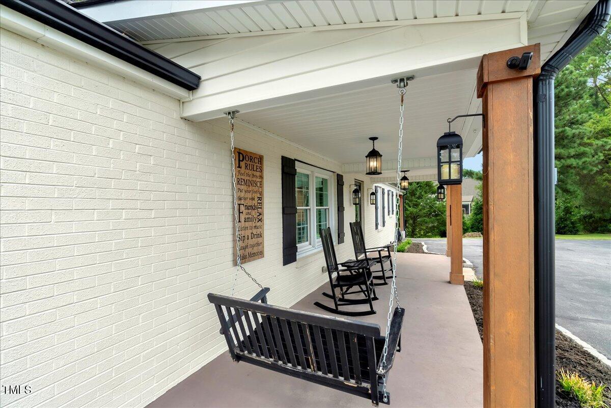 1856 Flat Rock Church Road Louisburg, NC 27549 - Photo 27 of 30 a view of balcony with couch