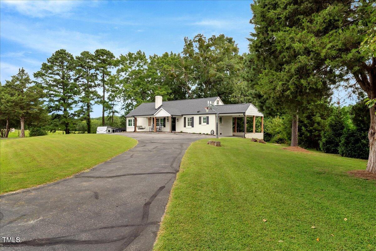 1856 Flat Rock Church Road Louisburg, NC 27549 - Photo 30 of 30 a front view of house with yard and green space