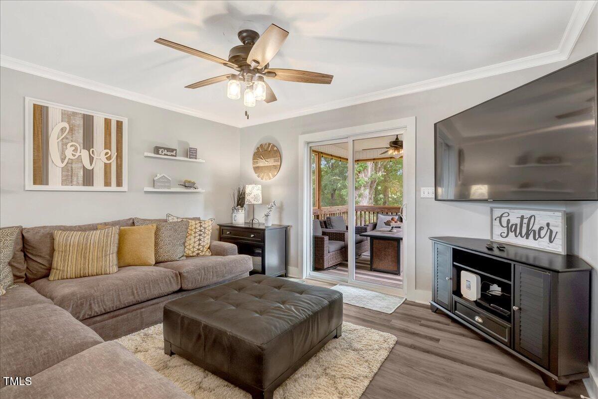 1856 Flat Rock Church Road Louisburg, NC 27549 - Photo 10 of 30 a living room with furniture and a fireplace