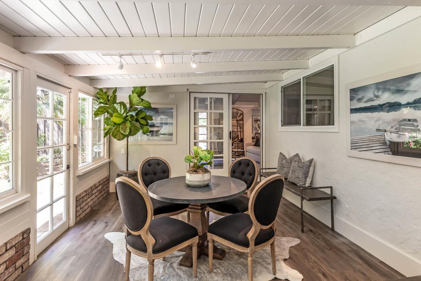 610 Magdalena Avenue Los Altos, CA 94024 - Photo 12 of 38 a dining room with furniture potted plants and wooden floor