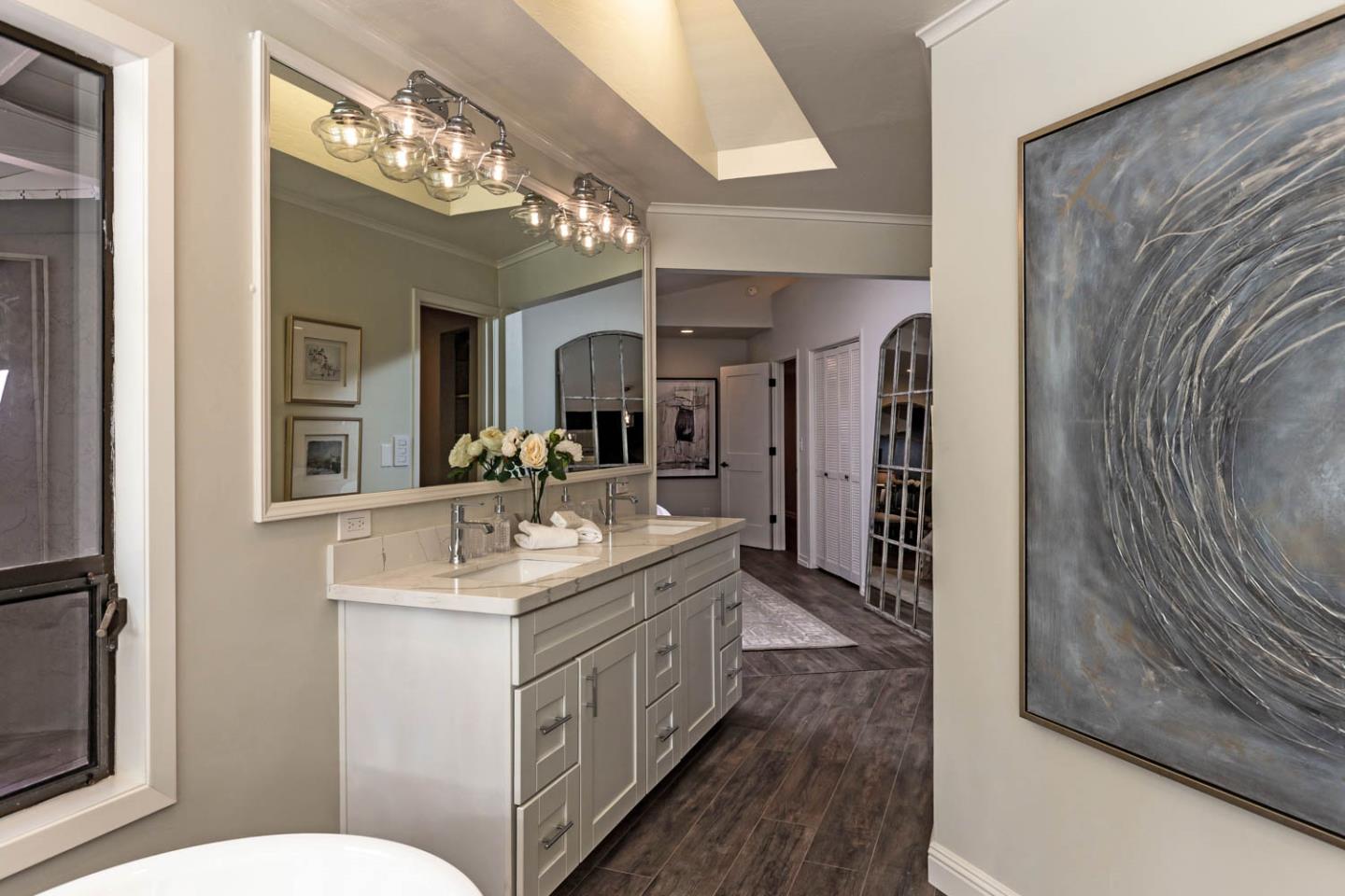 610 Magdalena Avenue Los Altos, CA 94024 - Photo 15 of 38 a bathroom with a sink a toilet and a mirror