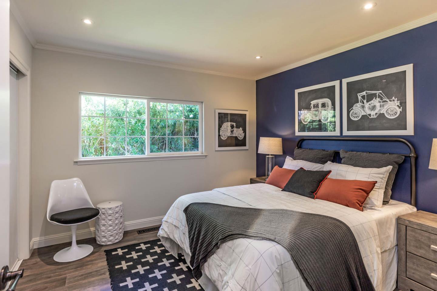 610 Magdalena Avenue Los Altos, CA 94024 - Photo 16 of 38 a bedroom with a bed and wooden floor
