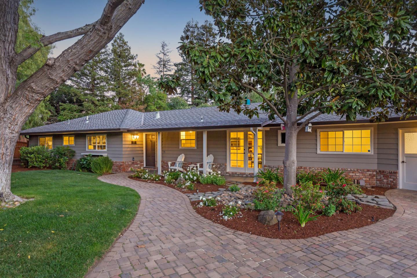 610 Magdalena Avenue Los Altos, CA 94024 - Photo 2 of 38 a front view of a house with garden